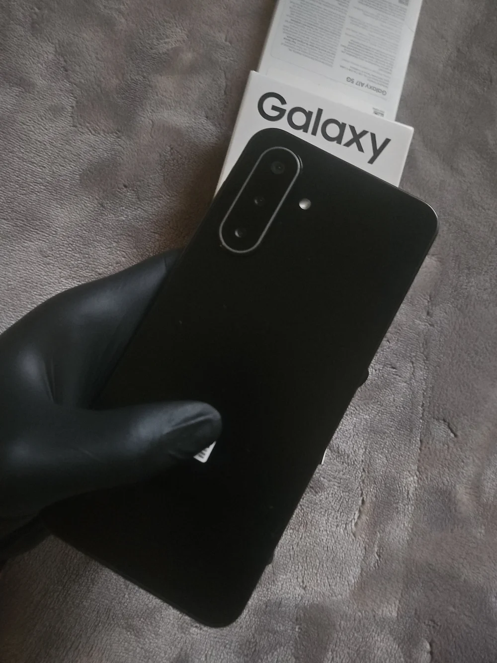 Samsung Black Galaxy Tablet/Phone Displayed with Charging Icon
